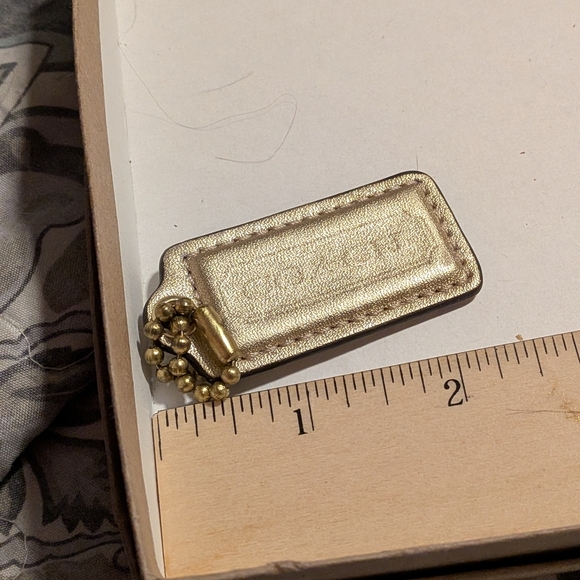 Coach Gold Hang Tag